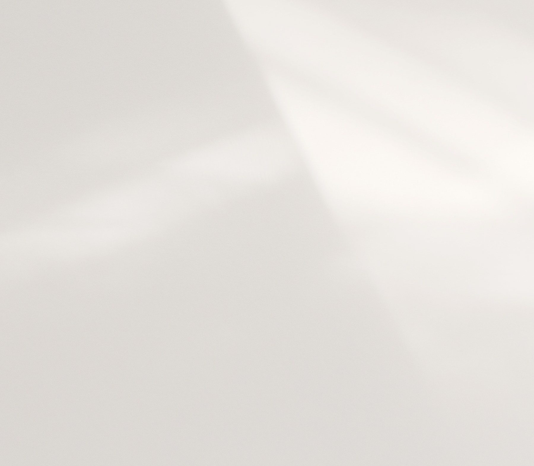 Soft shadows on a light surface.