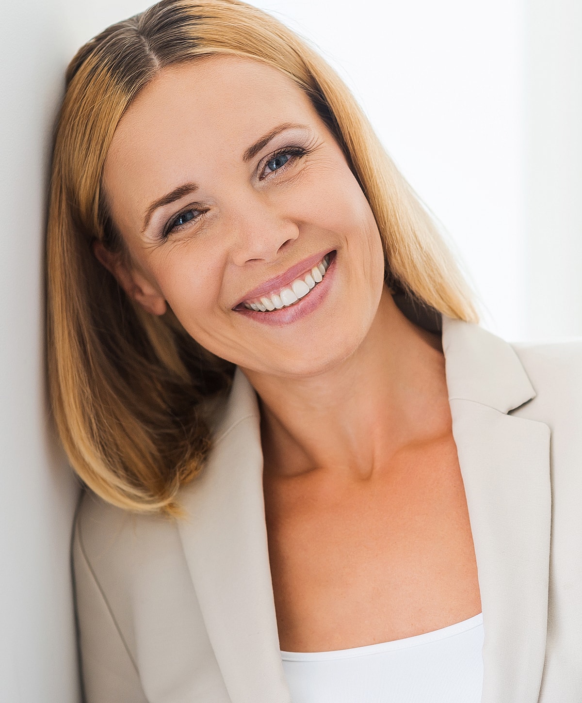 Woman in black leggings outdoors, focused on legs.