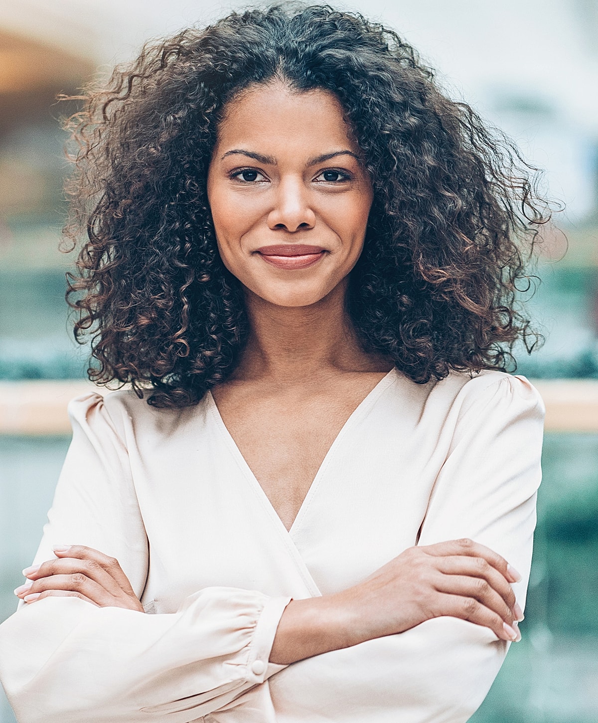 Woman walking up stairs in fitted jeans.