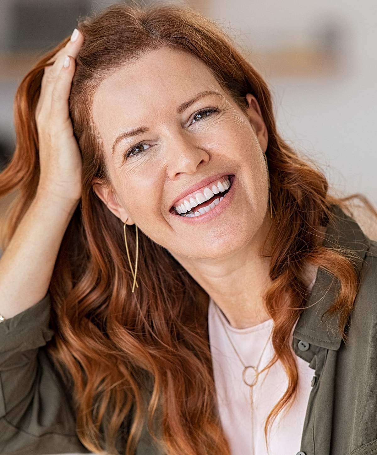 Woman walking up stairs in fitted jeans.