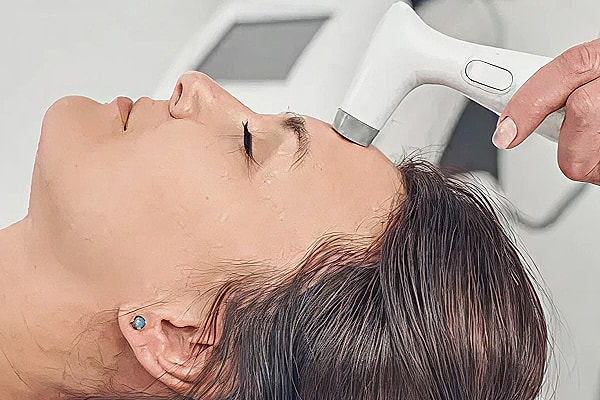 Facial treatment procedure in a spa setting.