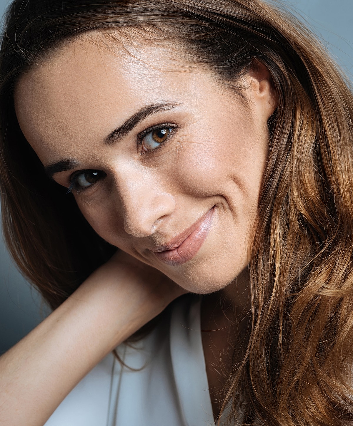 Woman walking up stairs in fitted jeans.
