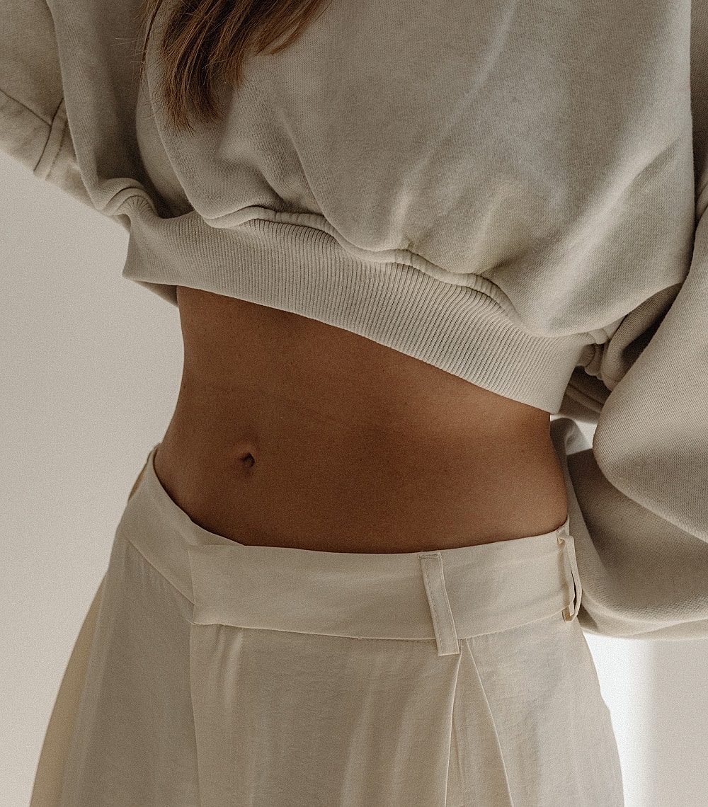 Casual outfit featuring cropped sweatshirt and pants.